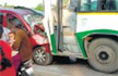 One dead, 4 injured in car-bus collision